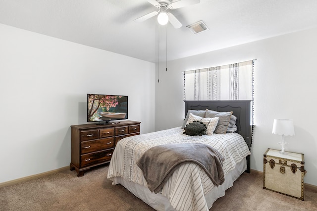 6907 Autumn Rain Ln, Spring, TX 77379 - carpeted bedroom with baseboards and ceiling fan