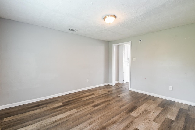 312 Hemphill St, Texas City, TX 77591 - empty room with wood finished floors and baseboards