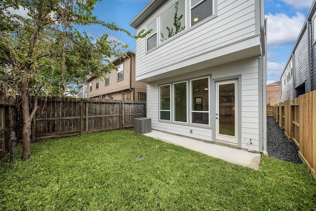 5238 Larkin St, Houston, TX 77007 - back of property with central AC and a patio area
