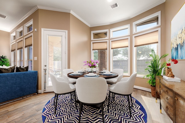 3266 Karleigh Way, Richmond, TX 77406 - dining room featuring wood finished floors, ornamental molding, and baseboards