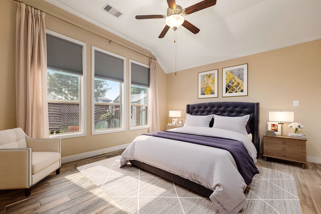 3266 Karleigh Way, Richmond, TX 77406 - bedroom with ornamental molding, light wood-style flooring, lofted ceiling, baseboards, and a ceiling fan