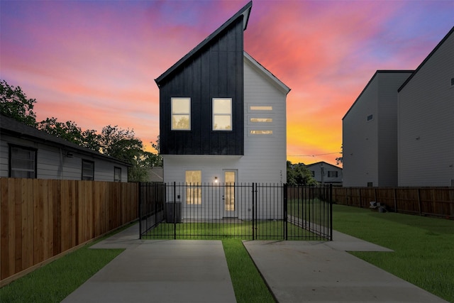 2475 Carmel St A/B, Unit A/B Houston, TX 77091 - contemporary house with board and batten siding and a patio area