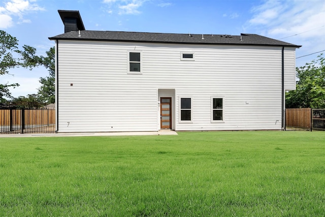 2475 Carmel St A/B, Unit A/B Houston, TX 77091 - rear view of property with a chimney
