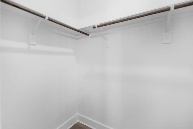 2475 Carmel St A/B, Unit A/B Houston, TX 77091 - walk in closet with dark wood-style floors