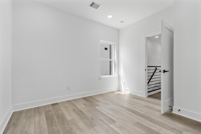 2475 Carmel St A/B, Unit A/B Houston, TX 77091 - unfurnished room with light wood-style floors, baseboards, and recessed lighting
