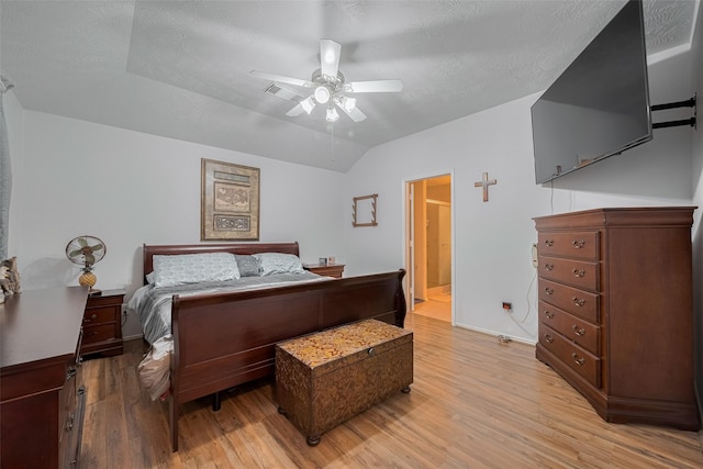 18019 Iris Edge Way, Cypress, TX 77429 - bedroom featuring vaulted ceiling, light wood-type flooring, and ceiling fan
