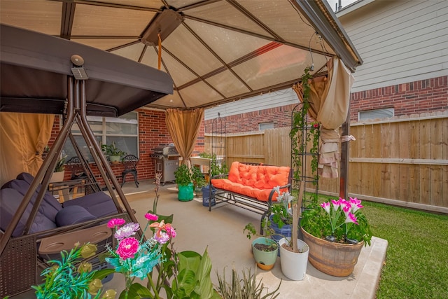 18019 Iris Edge Way, Cypress, TX 77429 - view of patio / terrace with a gazebo, an outdoor hangout area, and a grill