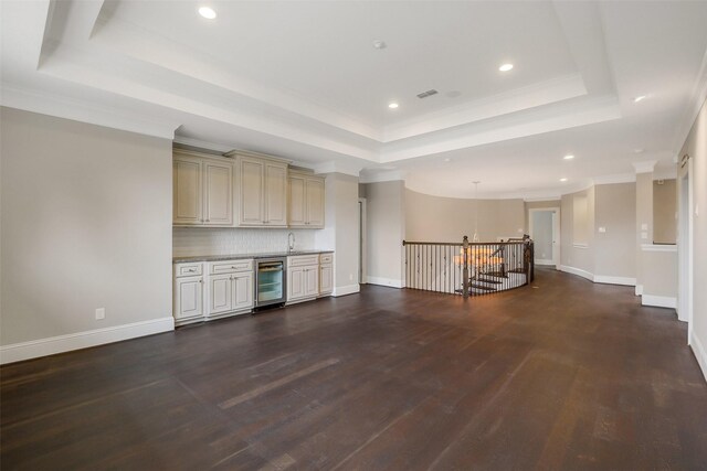 1518 Hillendahl Blvd, Houston, TX 77055 - indoor bar featuring a raised ceiling, beverage cooler, dark wood-style floors, recessed lighting, and baseboards