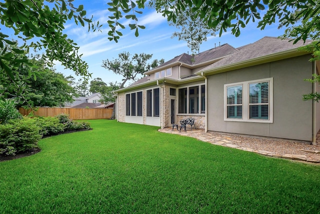 1518 Hillendahl Blvd, Houston, TX 77055 - rear view of house with stucco siding and a patio