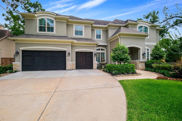 1518 Hillendahl Blvd, Houston, TX 77055 - view of front facade with stucco siding, a garage, and stone siding
