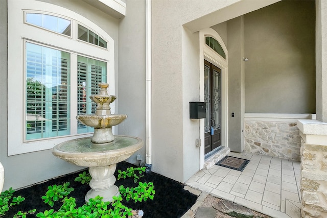 1518 Hillendahl Blvd, Houston, TX 77055 - view of exterior entry featuring stucco siding and stone siding