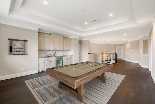 1518 Hillendahl Blvd, Houston, TX 77055 - playroom with a tray ceiling, beverage cooler, dark wood finished floors, bar with sink, and recessed lighting