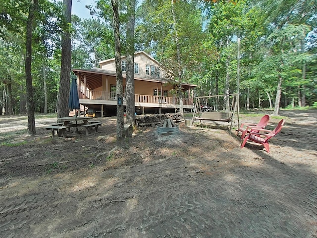 40 Dartmoor Ct, Coldspring, TX 77331 - view of front facade with a deck