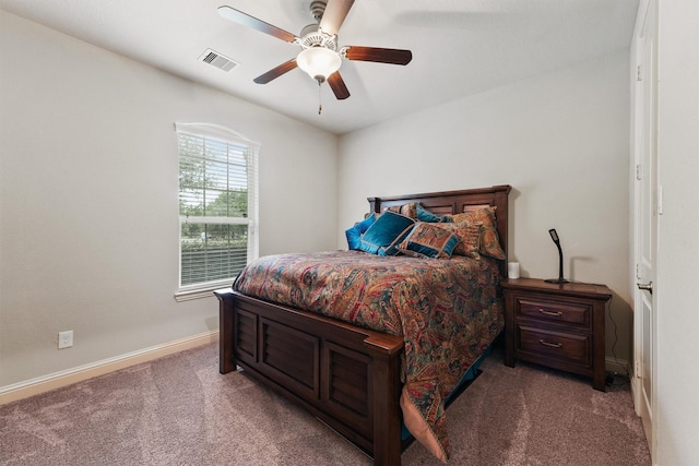 18786 Monetta Dr, New Caney, TX 77357 - carpeted bedroom with baseboards and ceiling fan