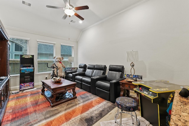 18786 Monetta Dr, New Caney, TX 77357 - living room with ceiling fan, ornamental molding, wood finished floors, lofted ceiling, and baseboards
