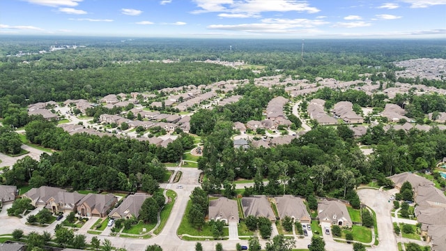 18786 Monetta Dr, New Caney, TX 77357 - aerial view of property's location with nearby suburban area and a heavily wooded area