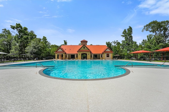 18786 Monetta Dr, New Caney, TX 77357 - community pool with a patio