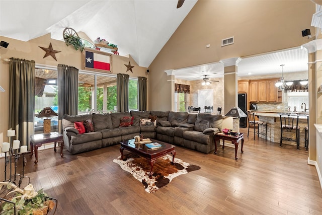 3602 Blue Lake Dr, Spring, TX 77388 - living room featuring ceiling fan, light wood-type flooring, and high vaulted ceiling