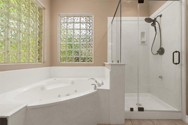 3602 Blue Lake Dr, Spring, TX 77388 - bathroom featuring a stall shower, a tub with jets, and tile patterned floors