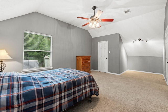 3602 Blue Lake Dr, Spring, TX 77388 - carpeted bedroom featuring vaulted ceiling, baseboards, and ceiling fan