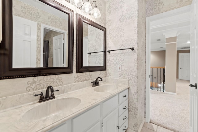 3602 Blue Lake Dr, Spring, TX 77388 - bathroom with wallpapered walls, baseboards, and double vanity
