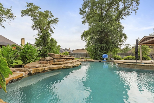 3602 Blue Lake Dr, Spring, TX 77388 - view of pool with a fenced backyard and a pool with connected hot tub