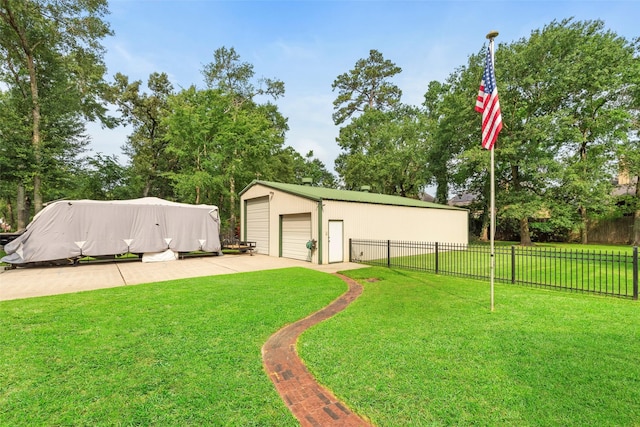3602 Blue Lake Dr, Spring, TX 77388 - view of yard featuring a detached garage and an outbuilding