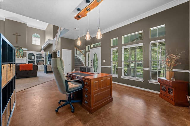 2474 Ripplewood Ct, Conroe, TX 77384 - office with concrete flooring, a towering ceiling, crown molding, a fireplace, and baseboards