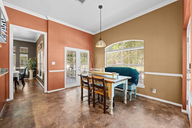 2474 Ripplewood Ct, Conroe, TX 77384 - dining area featuring finished concrete flooring, baseboards, french doors, ornamental molding, and a high ceiling