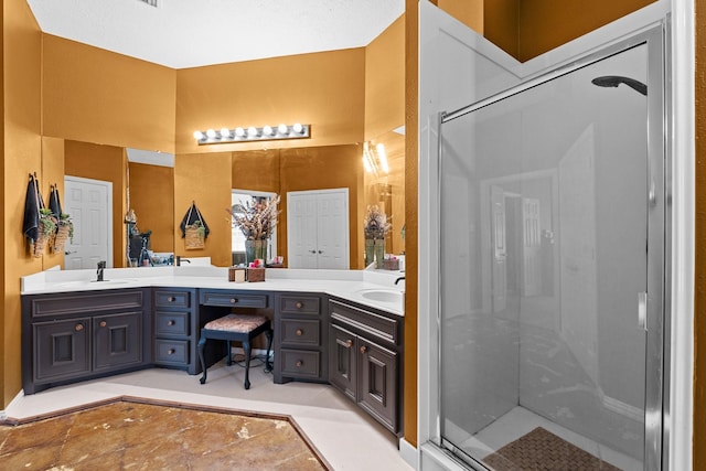 2474 Ripplewood Ct, Conroe, TX 77384 - bathroom featuring double vanity and a stall shower