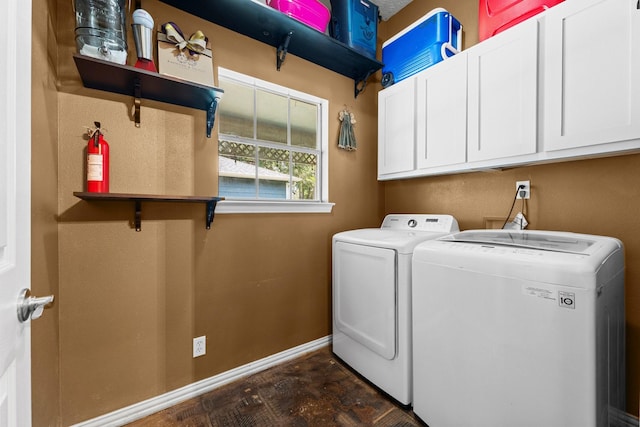 2474 Ripplewood Ct, Conroe, TX 77384 - laundry area featuring independent washer and dryer, cabinet space, and baseboards