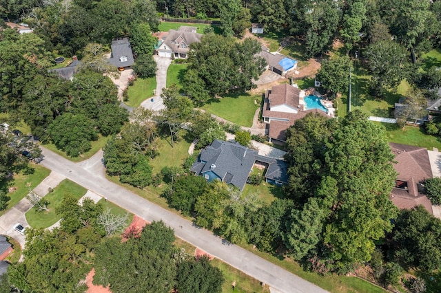 2474 Ripplewood Ct, Conroe, TX 77384 - aerial view of property and surrounding area with a pool and nearby suburban area