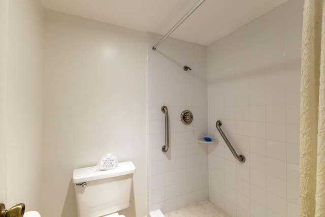 1860 White Oak Dr Unit 333, Houston, TX 77009 - bathroom featuring toilet and a tile shower
