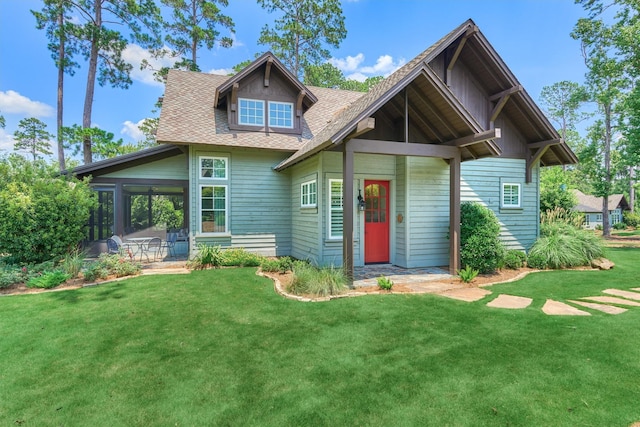 26150 Bluejack National Blvd Unit 35, Montgomery, TX 77316 - craftsman-style house featuring a front lawn, roof with shingles, and a sunroom