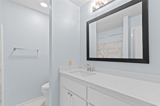 11818 Guadalupe River Dr, Houston, TX 77067 - full bath with a textured ceiling, toilet, vanity, tile patterned floors, and a shower