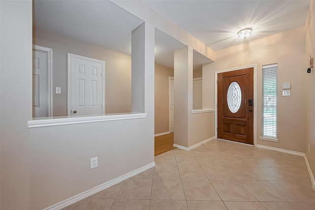 16715 Red Falls Cir, Houston, TX 77095 - entrance foyer featuring baseboards and light tile patterned flooring