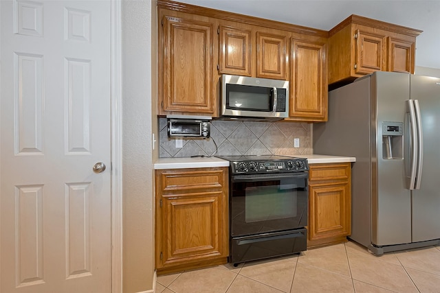 16715 Red Falls Cir, Houston, TX 77095 - kitchen with appliances with stainless steel finishes, light tile patterned floors, light countertops, and brown cabinetry