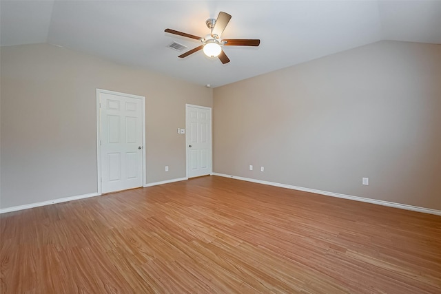 16715 Red Falls Cir, Houston, TX 77095 - empty room featuring vaulted ceiling, ceiling fan, light wood finished floors, and baseboards
