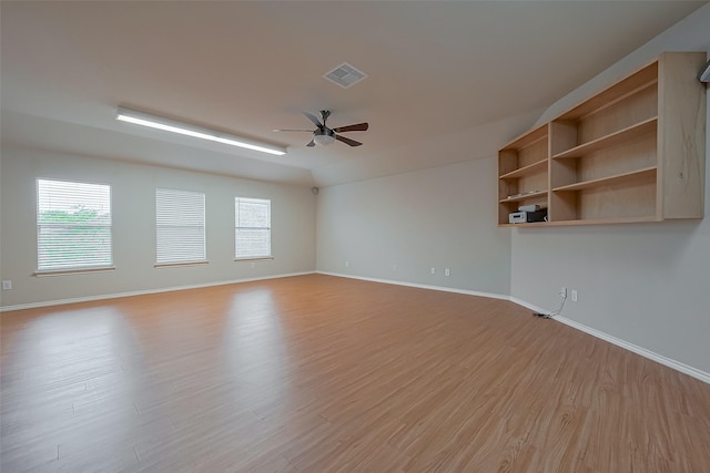 16715 Red Falls Cir, Houston, TX 77095 - unfurnished room featuring a ceiling fan, light wood finished floors, baseboards, and healthy amount of natural light