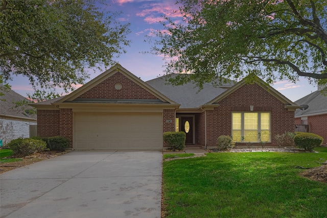 16715 Red Falls Cir, Houston, TX 77095 - view of front of house with an attached garage, a front lawn, brick siding, concrete driveway, and roof with shingles