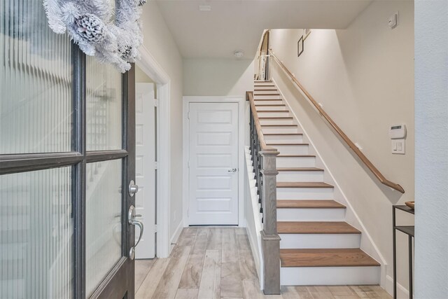 2818 Grand Fountains Dr Unit C, Houston, TX 77054 - staircase featuring wood finished floors and baseboards