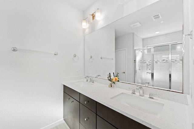 5411 Cavall Rd, Missouri City, TX 77459 - full bathroom featuring a shower stall, double vanity, and baseboards