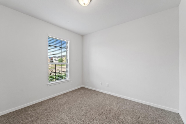 5411 Cavall Rd, Missouri City, TX 77459 - carpeted empty room with baseboards