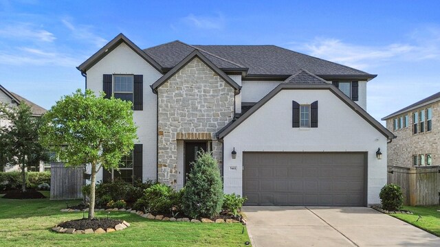 5411 Cavall Rd, Missouri City, TX 77459 - french country style house with stone siding and driveway