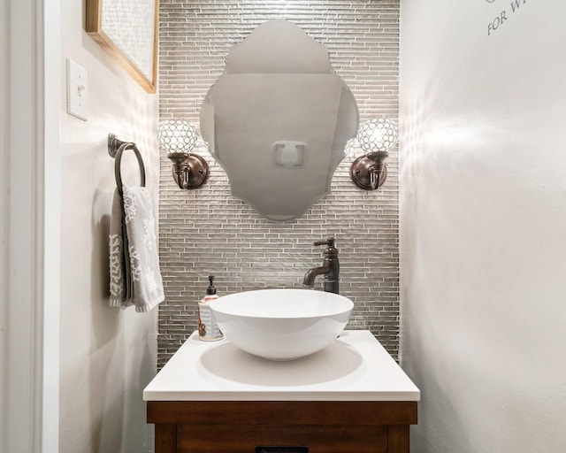 15726 Steamboat Ln, Houston, TX 77079 - bathroom with vanity, tasteful backsplash, and tile walls