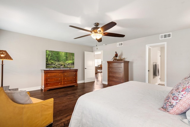15726 Steamboat Ln, Houston, TX 77079 - bedroom featuring wood finished floors, a ceiling fan, and baseboards