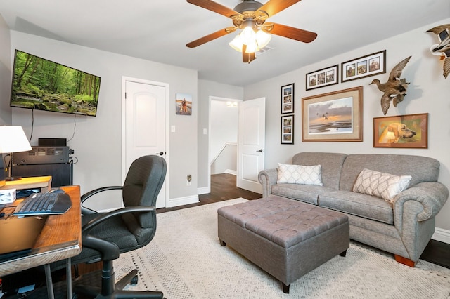 15726 Steamboat Ln, Houston, TX 77079 - office area with baseboards, a ceiling fan, and wood finished floors