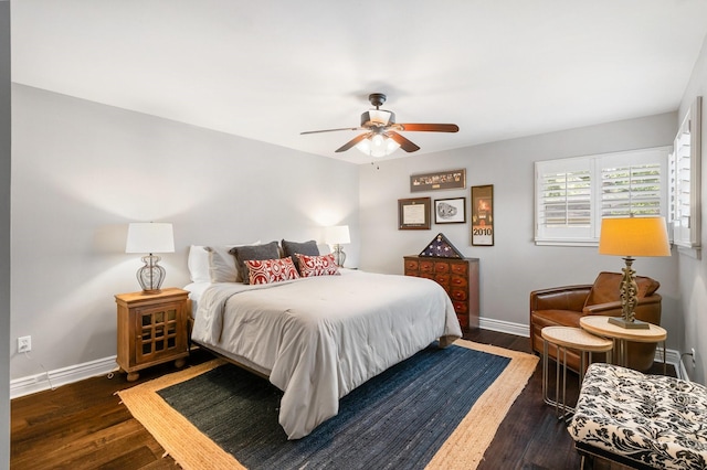 15726 Steamboat Ln, Houston, TX 77079 - bedroom featuring baseboards, wood finished floors, and a ceiling fan