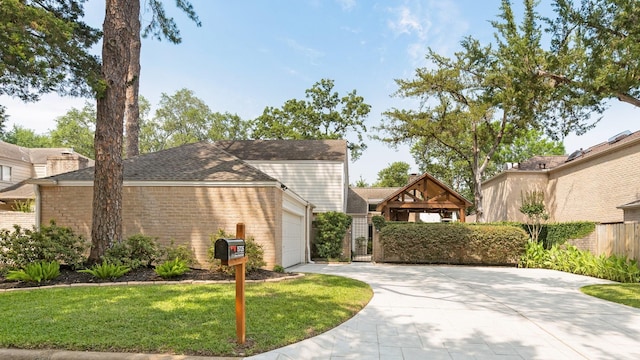 15726 Steamboat Ln, Houston, TX 77079 - view of front of home featuring driveway, a garage, brick siding, and roof with shingles