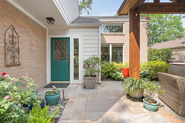 15726 Steamboat Ln, Houston, TX 77079 - property entrance featuring a patio area and brick siding